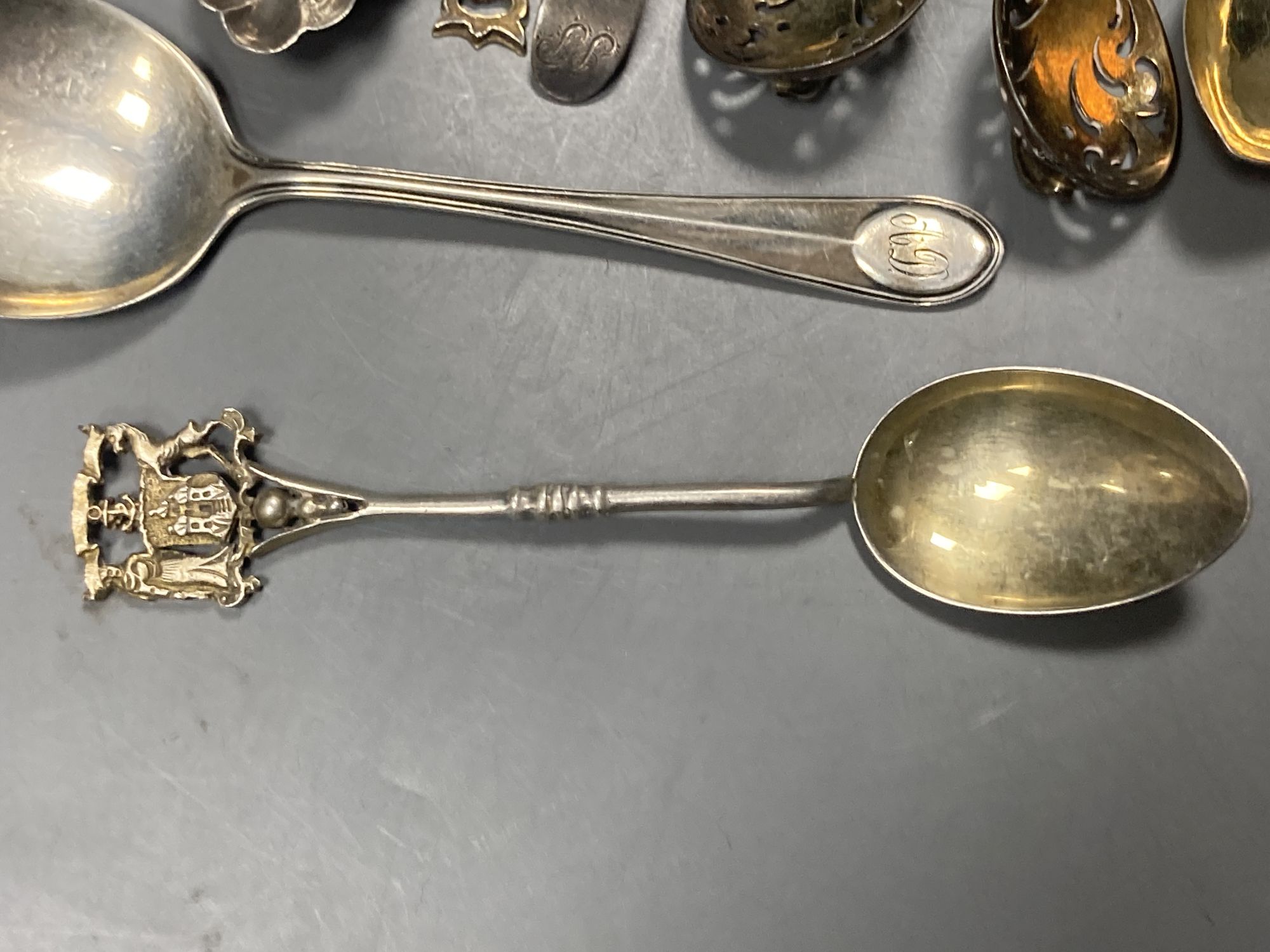 A group of assorted Chinese white metal spoons and forks, including set of six teaspoons and ten small items of English silver.